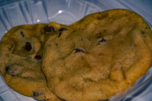 two fresh chocolate chip cookies